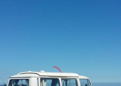 vw camper rental to go to the beach surfer